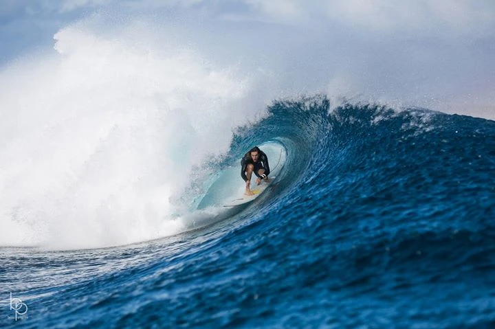 Longboarders and intermediate surfers enjoying Natadola Inside Left, Fiji.