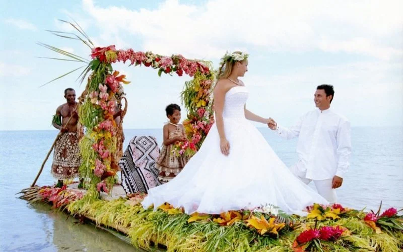 a private traditional fijian wedding boat at Nukubati private island Fiji