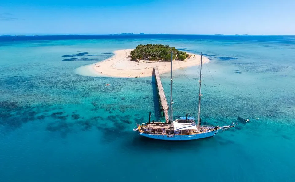 boat docked on island to the lau