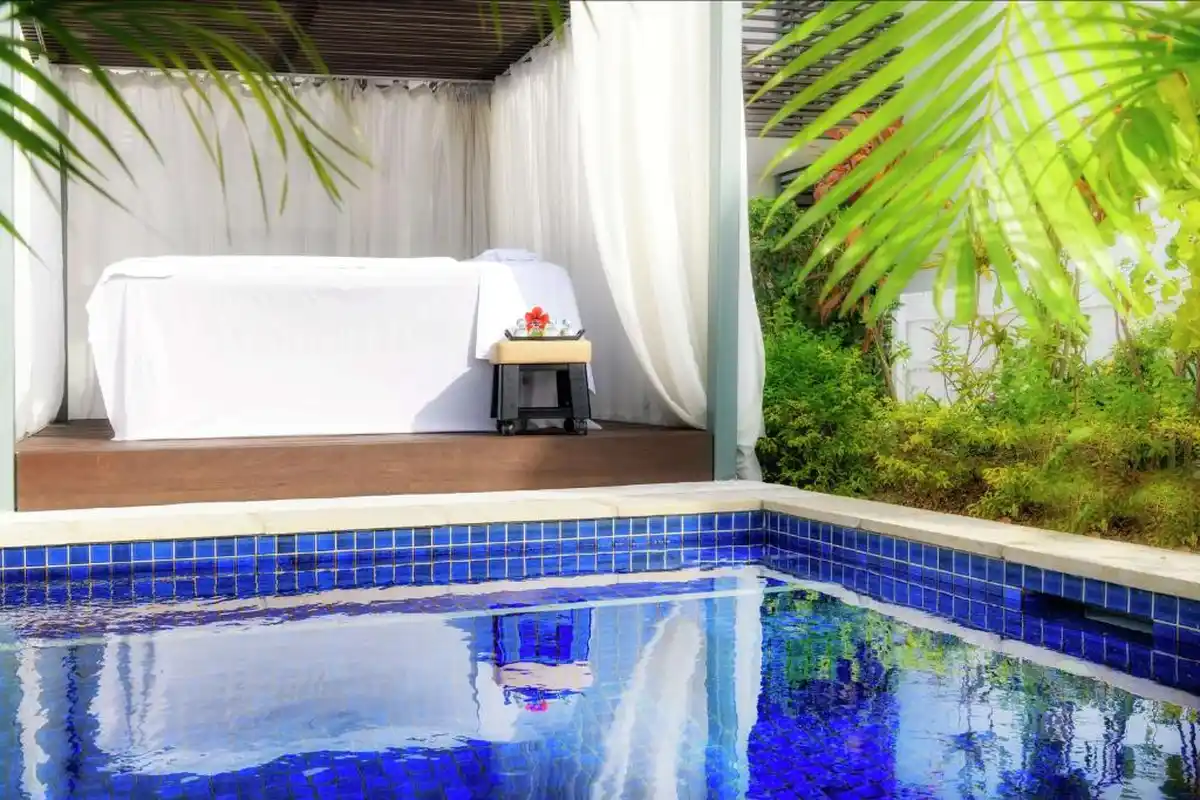 Outdoor spa area with poolside at award winning spa