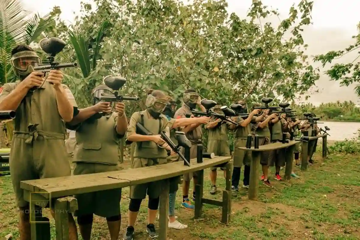 family of kids paintballing at and having an island adventure